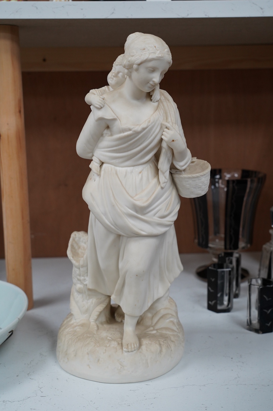 A Parian ware figure group of mother and child, 40cm. Condition - good